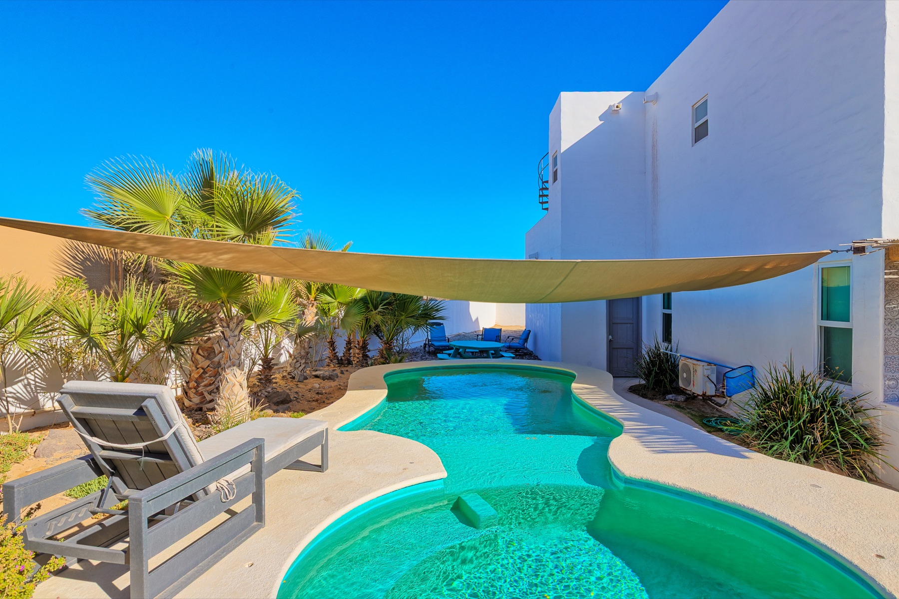 Casa Gio's private pool with updated lounge seating